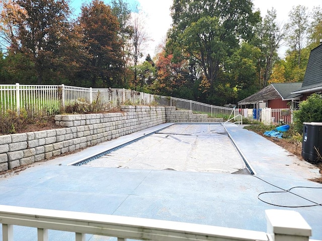 3530 Coats Rd, Hector, NY 14818 - view of pool featuring a fenced backyard, central AC unit, and view of scattered trees