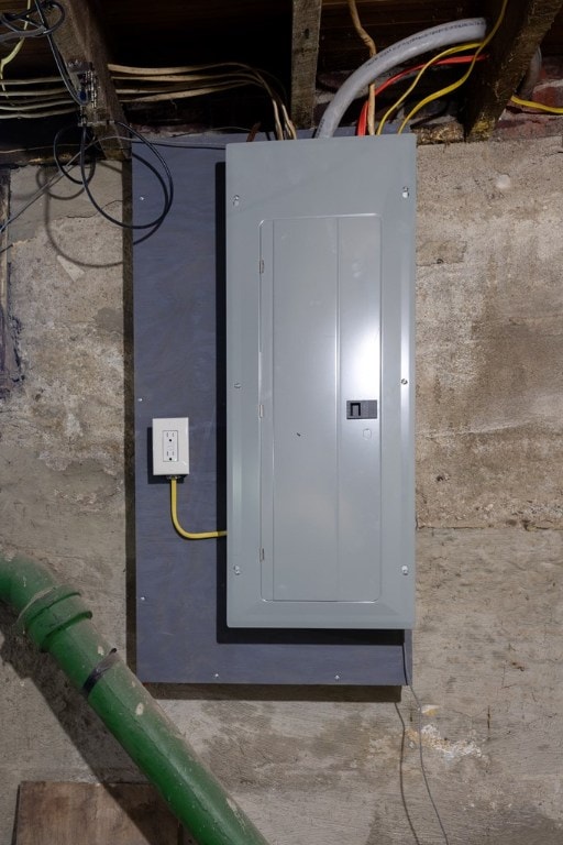 utility room featuring electric panel