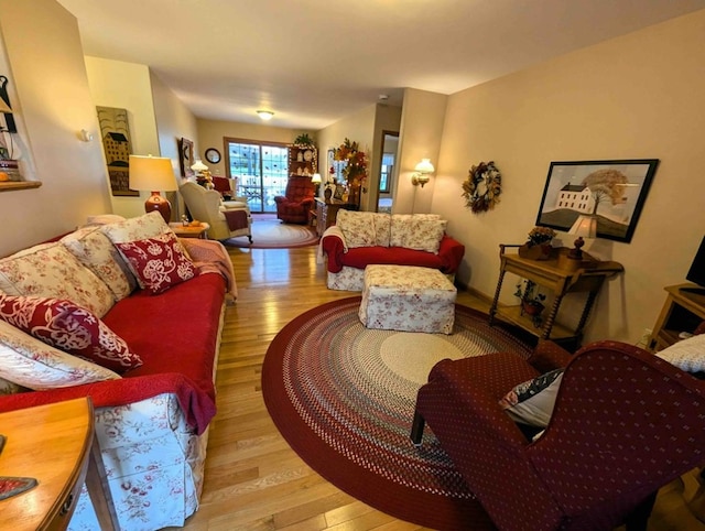 living room with light hardwood / wood-style flooring