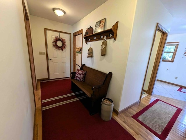 doorway to outside with light wood-type flooring