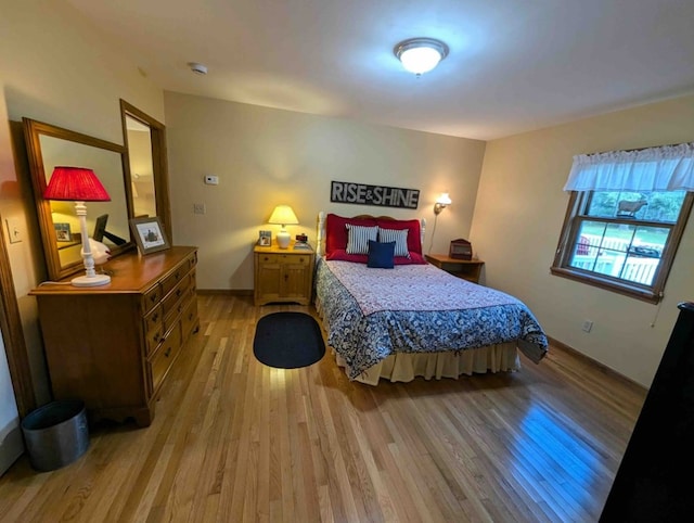 bedroom featuring light hardwood / wood-style flooring