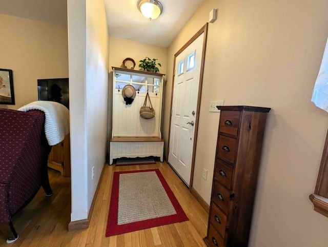 doorway with light hardwood / wood-style flooring