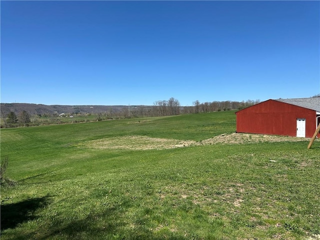 345 Ridge Rd, Veteran, NY 14845 - view of yard featuring a pole building and an outbuilding