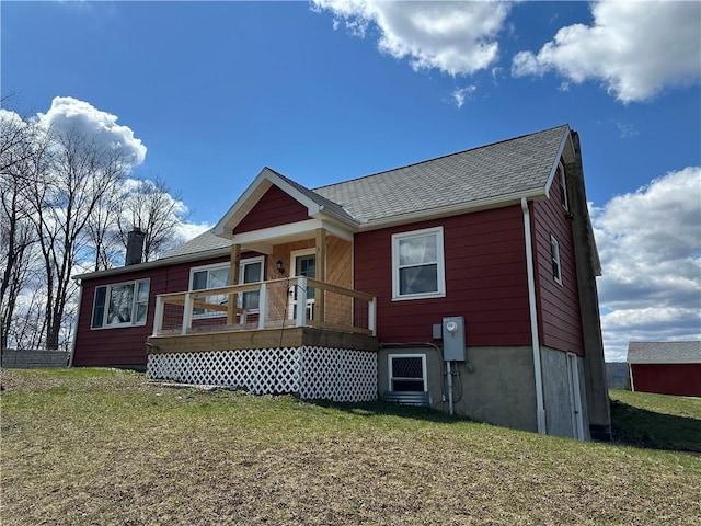 345 Ridge Rd, Veteran, NY 14845 - back of house with a shingled roof, a wooden deck, and a yard