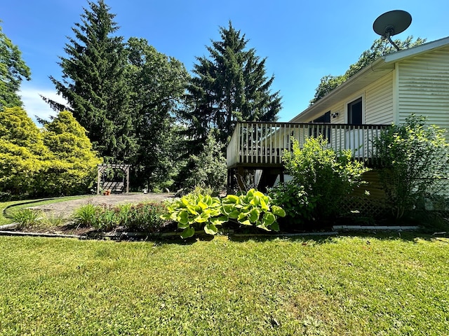 view of yard with a wooden deck