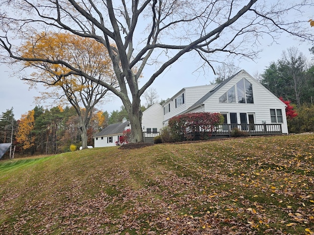 exterior space with an outbuilding and a front yard