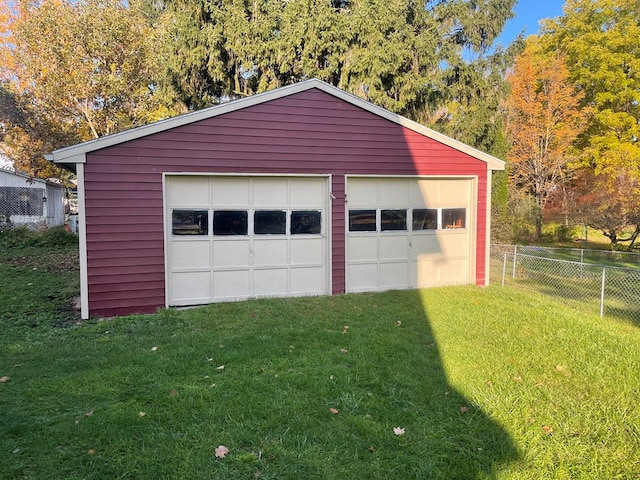 garage with a yard