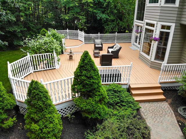 wooden terrace featuring an outdoor living space