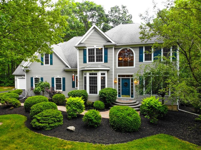 colonial-style house with a garage