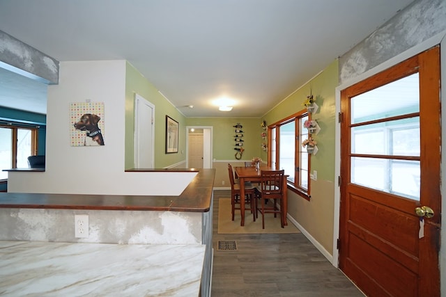 interior space featuring dark wood-type flooring