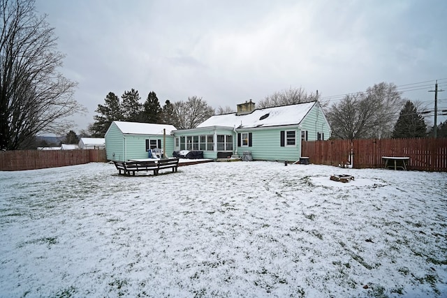 view of snow covered property