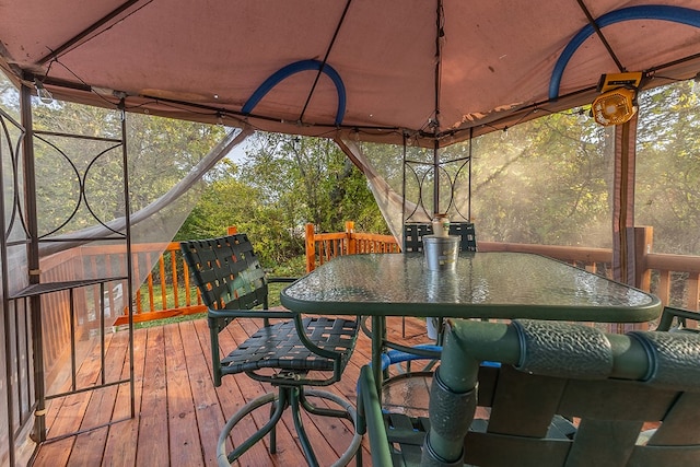 wooden deck with a gazebo