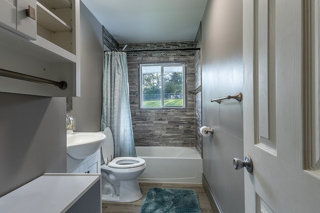 full bathroom with vanity, toilet, and shower / tub combo with curtain