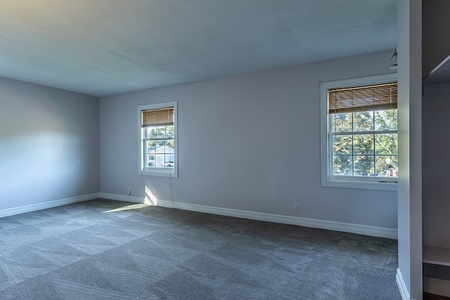 empty room featuring carpet flooring