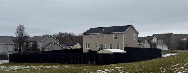 view of snow covered house