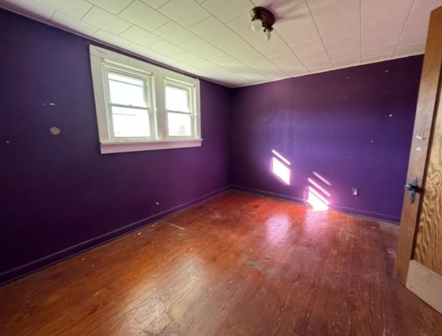 empty room featuring hardwood / wood-style floors