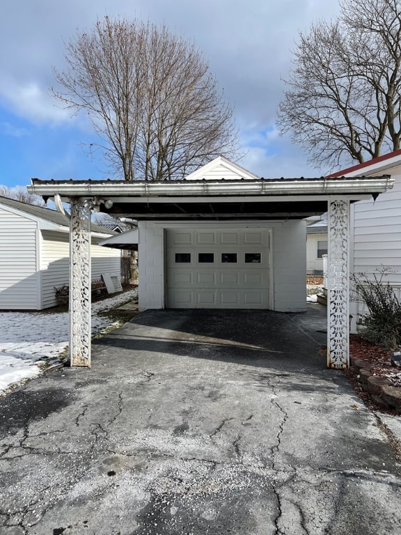 garage with a carport