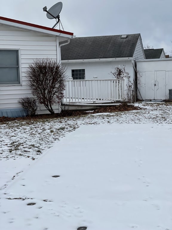 view of snow covered property