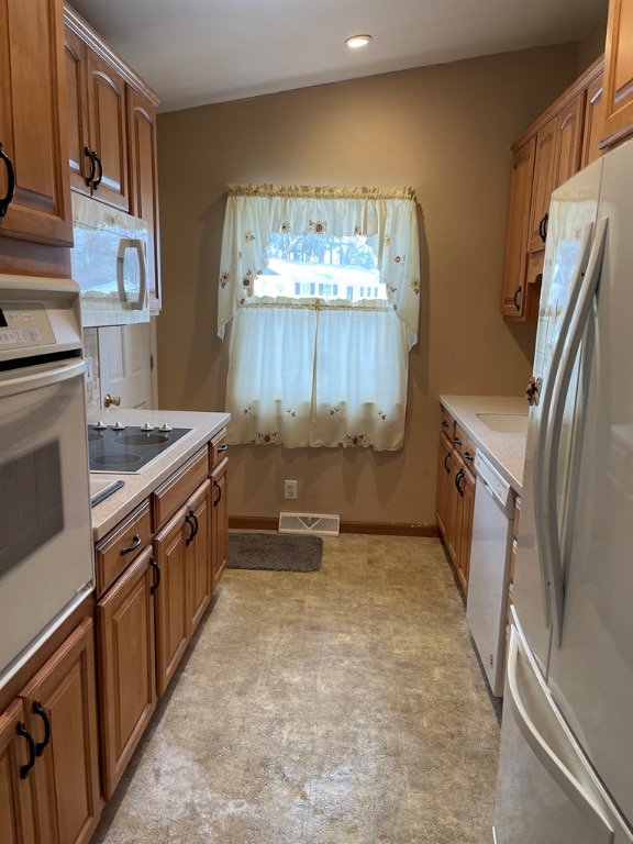 kitchen featuring white appliances