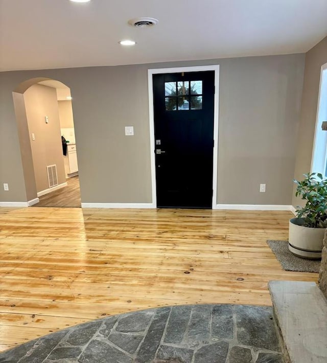 entrance foyer featuring light hardwood / wood-style floors