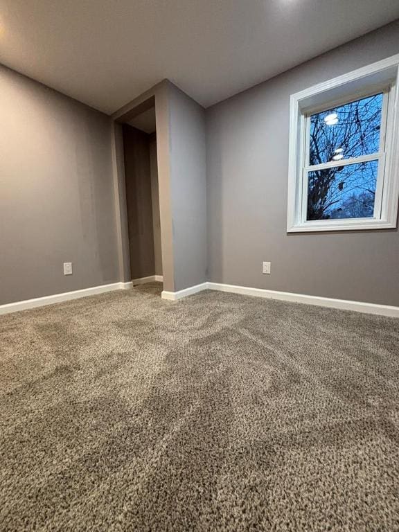 view of carpeted spare room