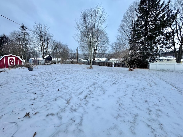 view of yard covered in snow