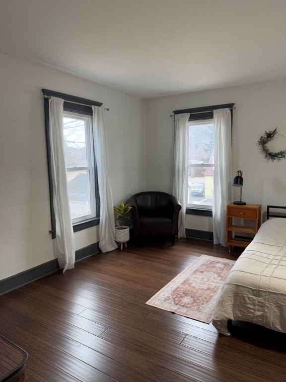 bedroom featuring dark hardwood / wood-style flooring