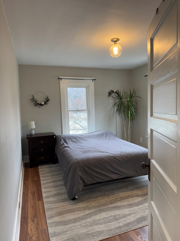 bedroom featuring hardwood / wood-style flooring