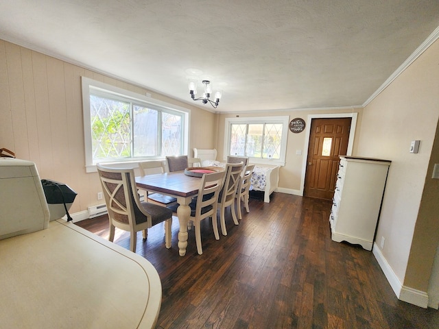 dining space with an inviting chandelier, ornamental molding, a textured ceiling, dark hardwood / wood-style flooring, and a baseboard radiator