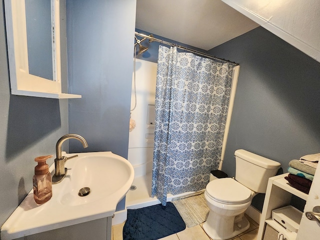 bathroom with vanity, a shower with curtain, tile patterned floors, and toilet