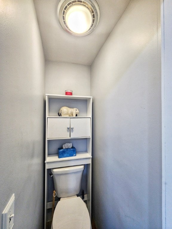 bathroom featuring toilet