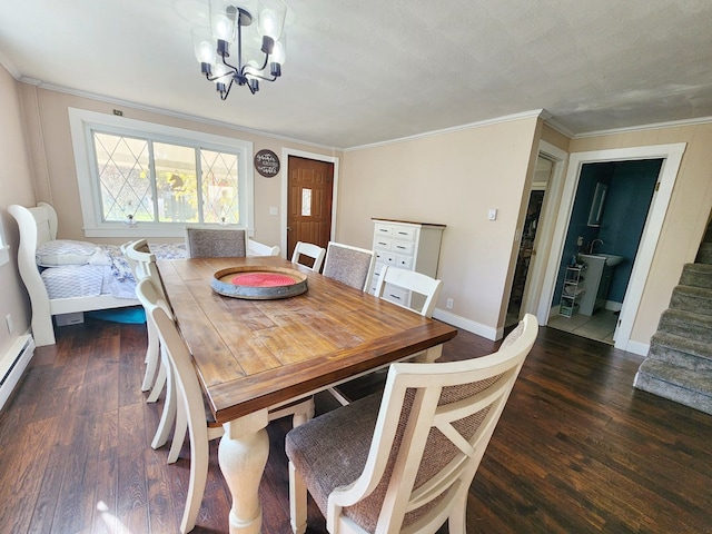 dining space featuring crown molding, dark hardwood / wood-style floors, and a notable chandelier