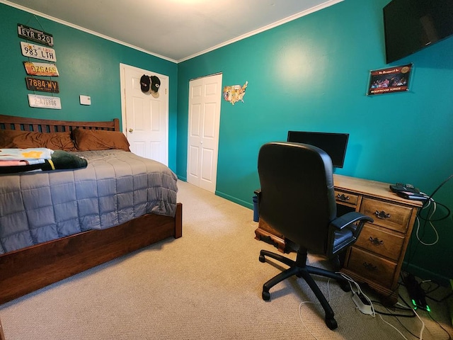 carpeted bedroom with ornamental molding