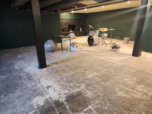 basement with a fireplace