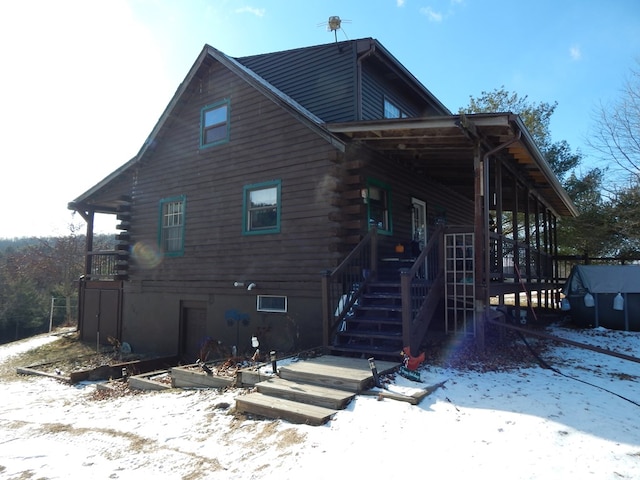 exterior space with log siding