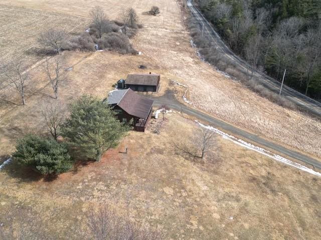 birds eye view of property featuring a rural view