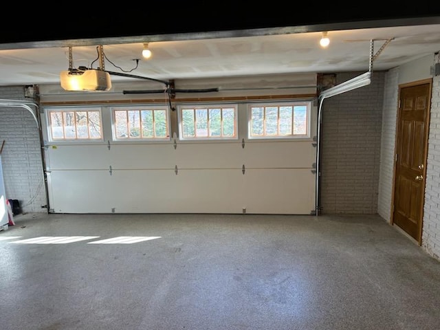 garage featuring a garage door opener