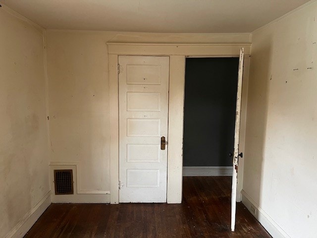 interior space with dark wood-type flooring