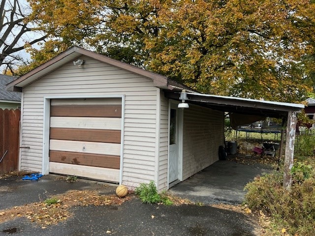 garage with a carport