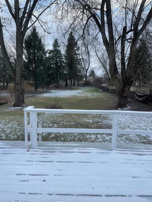 view of snow covered deck