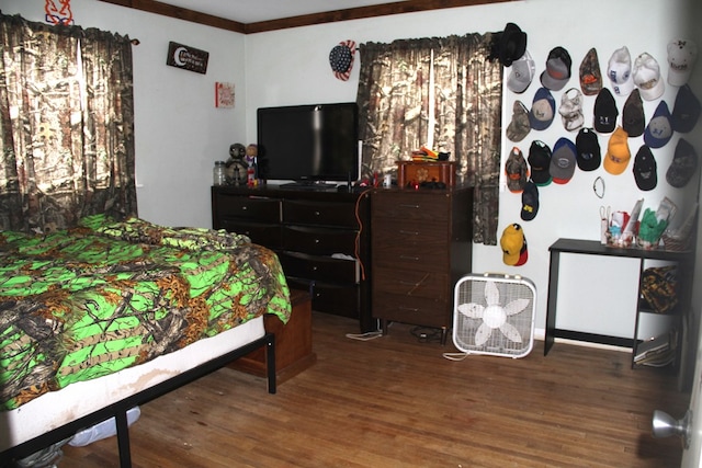 bedroom with wood-type flooring