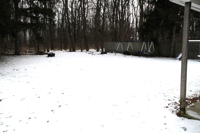 view of yard covered in snow