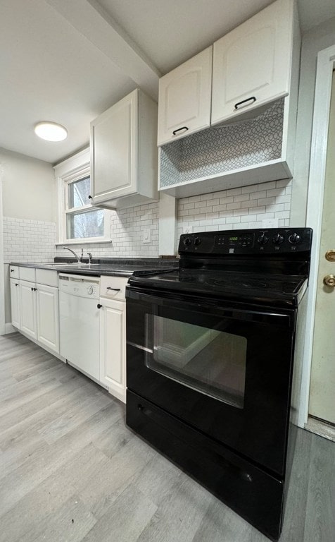 kitchen featuring electric range, white dishwasher, tasteful backsplash, white cabinets, and light wood-type flooring