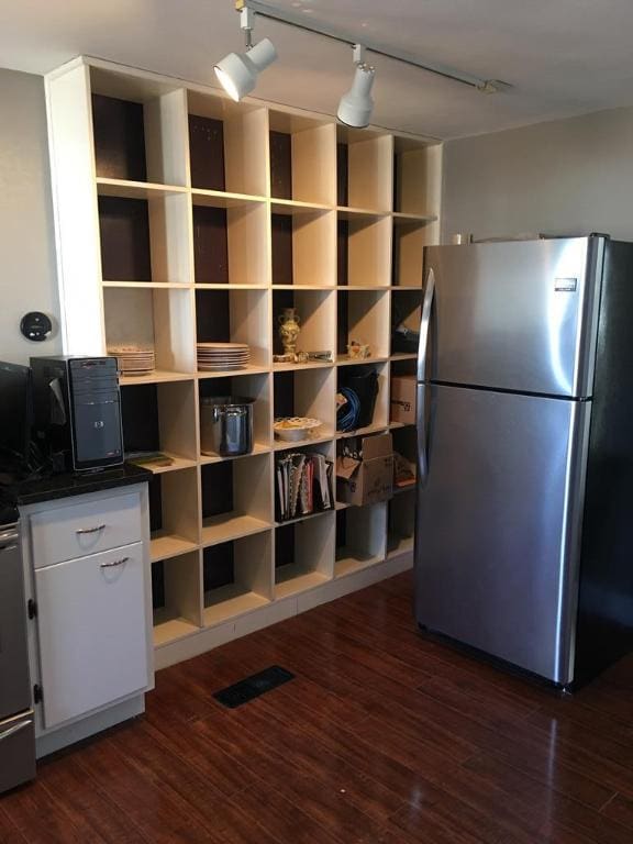 interior space with dark hardwood / wood-style floors