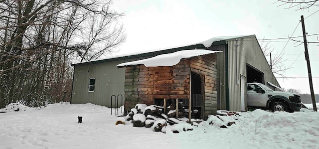 view of snow covered property