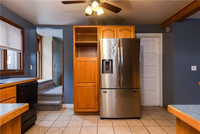 kitchen featuring black dishwasher, brown cabinets, light tile patterned floors, ceiling fan, and stainless steel fridge with ice dispenser