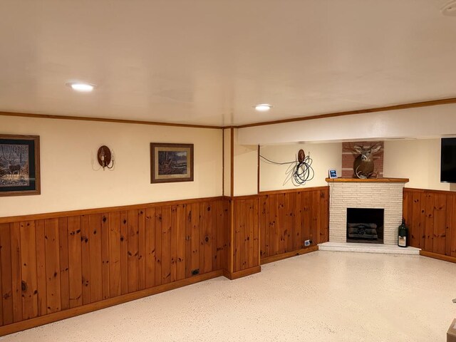 175 Beartown Rd, Erwin, NY 14870 - unfurnished living room featuring wainscoting, wooden walls, a brick fireplace, and recessed lighting