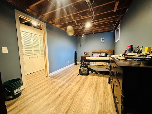 bedroom with light hardwood / wood-style floors