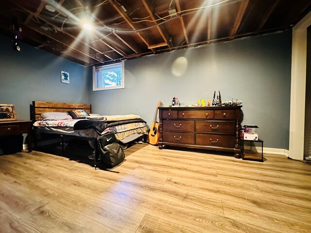 bedroom with light hardwood / wood-style flooring