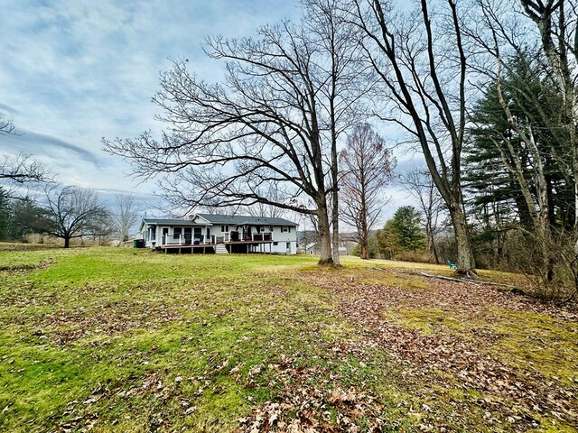 view of yard featuring a deck